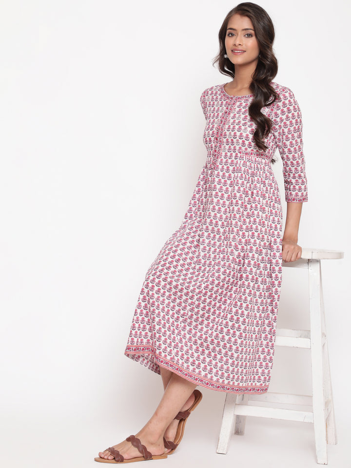Woman posing in Savi's Cotton Block Printed White Flared Dress