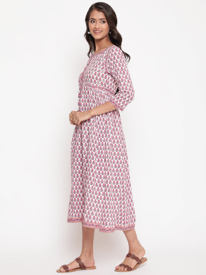 Woman posing in Savi's Cotton Block Printed White Flared Dress