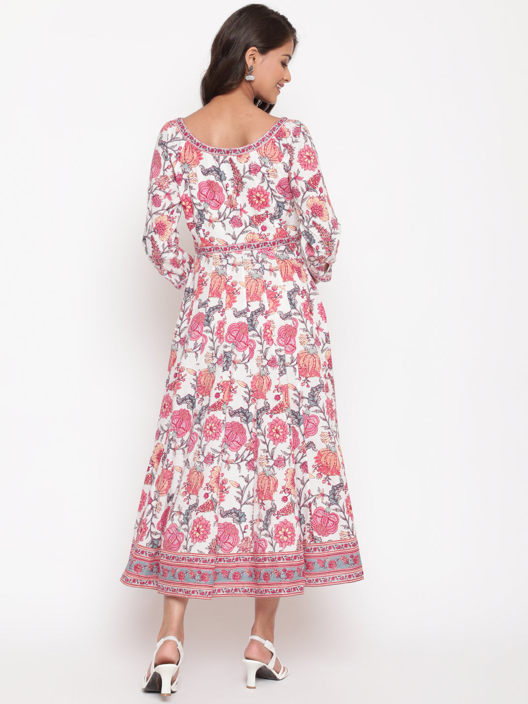 Woman posing in Savi's White Cotton Floral Flared Long Dress