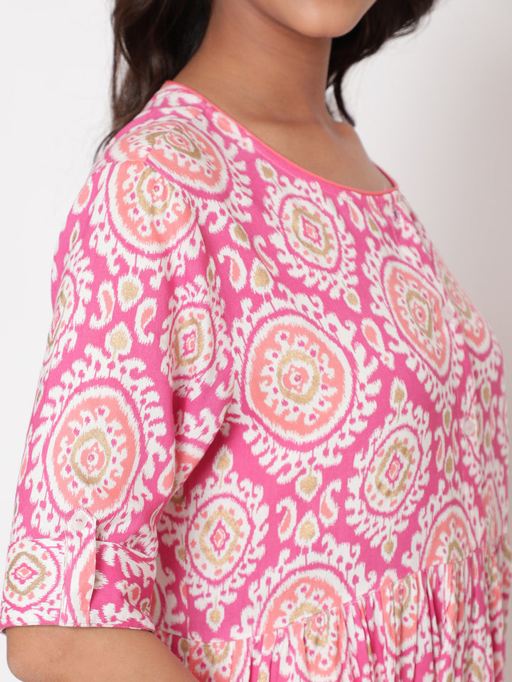 Woman posing in Savi's Designer Pink Ikat Printed Dress