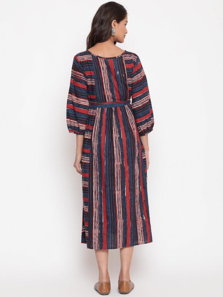 Woman posing in Savi's Bagru Printed Striped Tie up Designer Dress