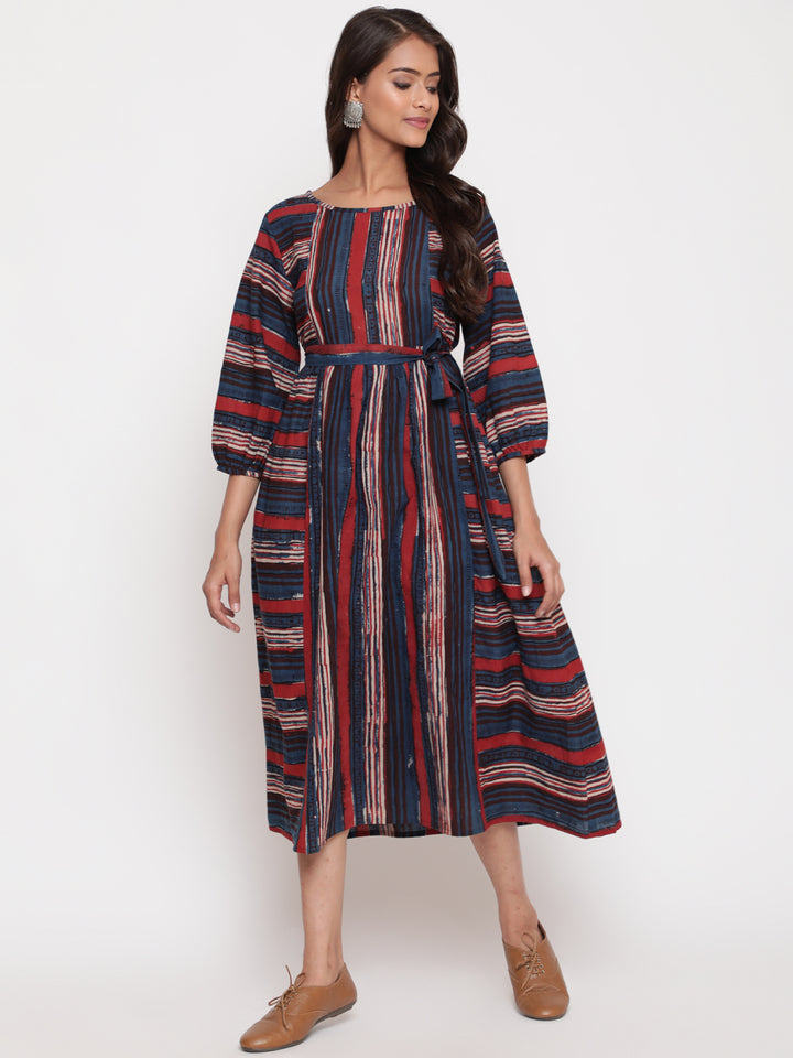 Woman posing in Savi's Bagru Printed Striped Tie up Designer Dress
