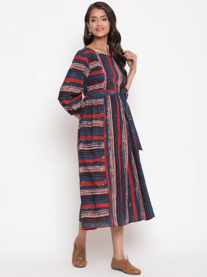 Woman posing in Savi's Bagru Printed Striped Tie up Designer Dress