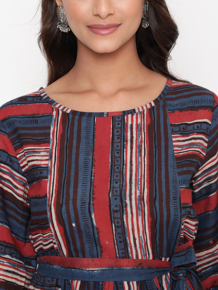 Woman posing in Savi's Bagru Printed Striped Tie up Designer Dress