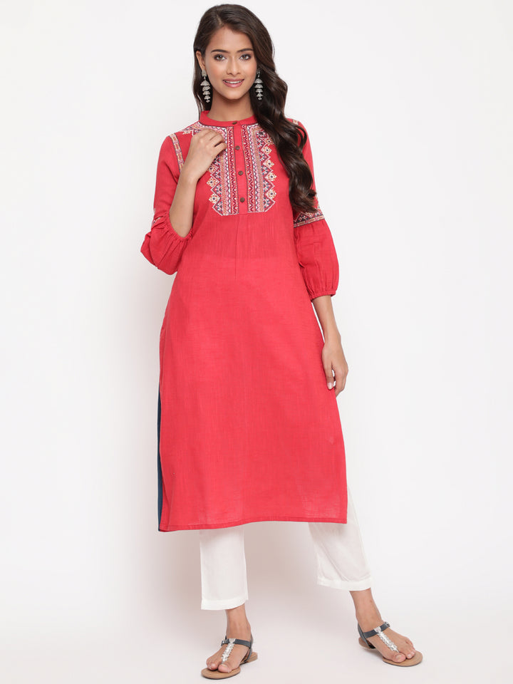 Woman posing in Red Embroidered Designer A Line Kurta