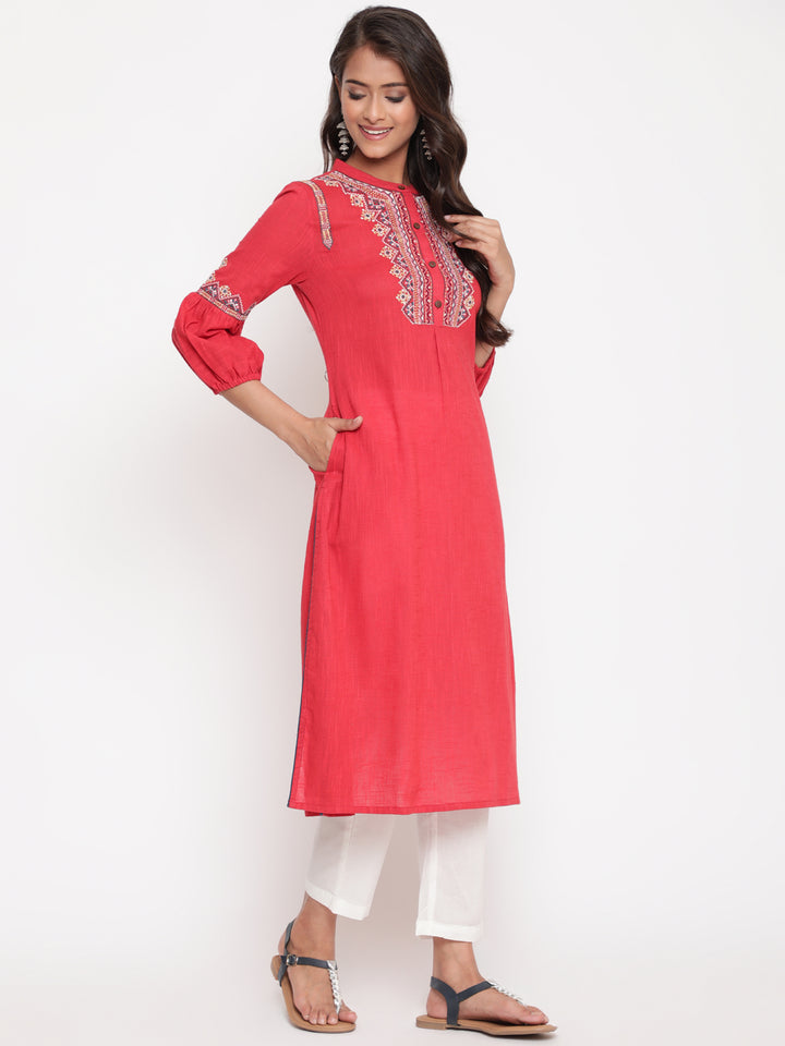Woman posing in Red Embroidered Designer A Line Kurta