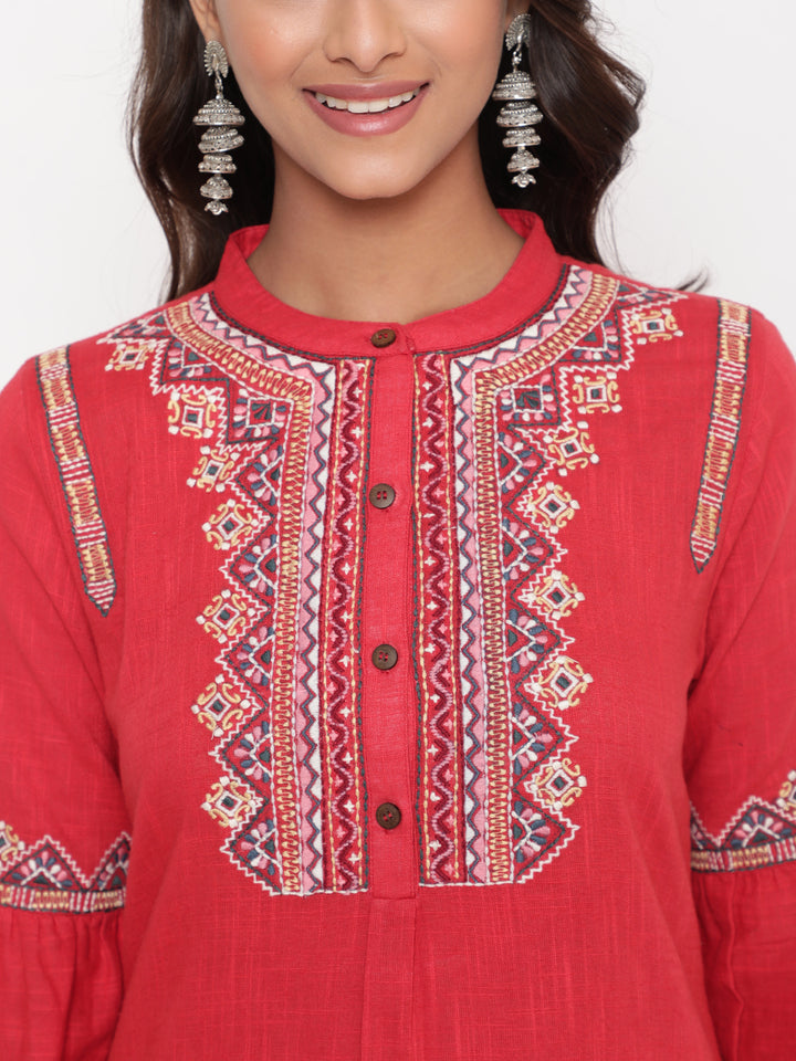 Woman posing in Red Embroidered Designer A Line Kurta