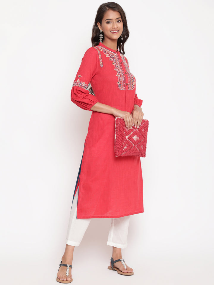 Woman posing in Red Embroidered Designer A Line Kurta