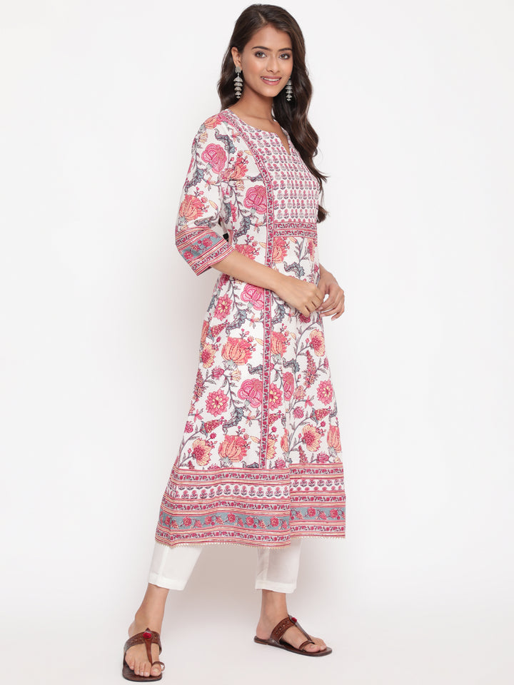 Woman posing in Savi's Pink Cotton Floral Printed Embellished Flared Kurta