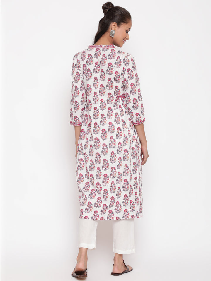 Woman posing in Savi's Paisely Cotton Printed White A Line Kurta With Printed Pant