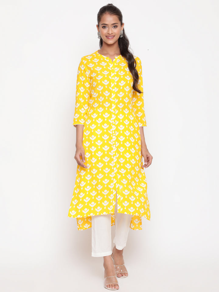 Savi model posing in Yellow Printed Mandarin Collar High Low Kurta