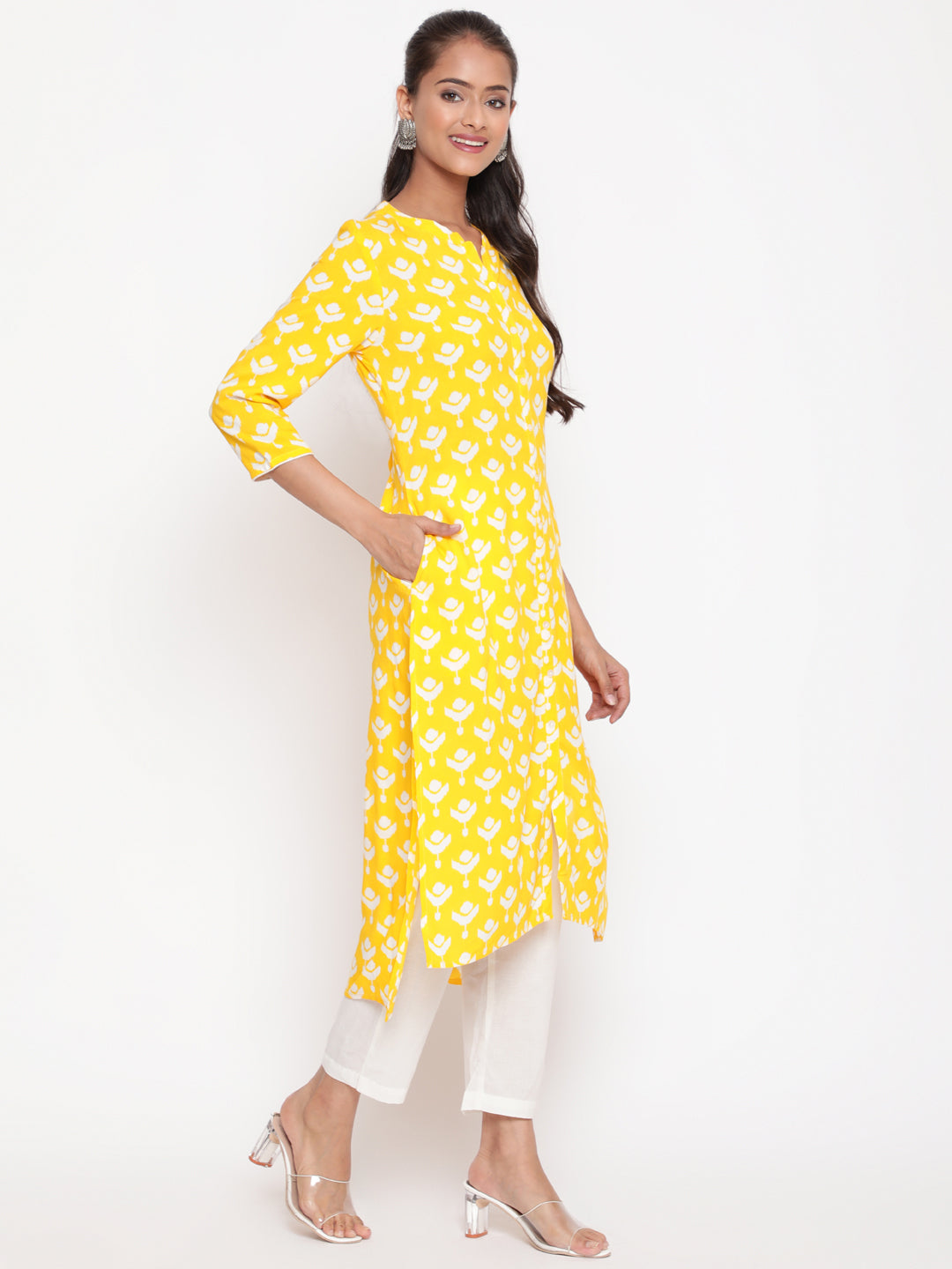 Savi model posing in Yellow Printed Mandarin Collar High Low Kurta