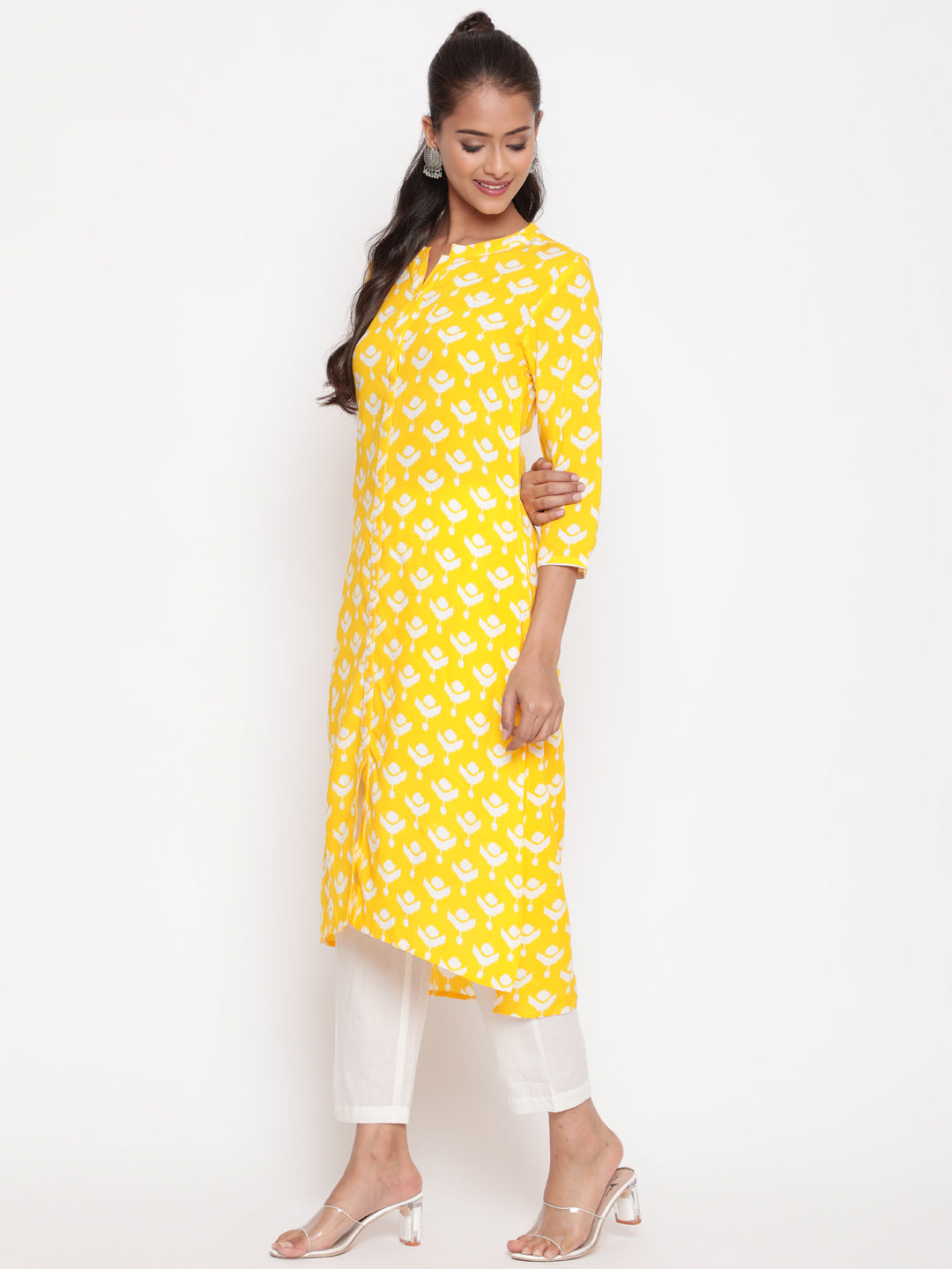 Savi model posing in Yellow Printed Mandarin Collar High Low Kurta