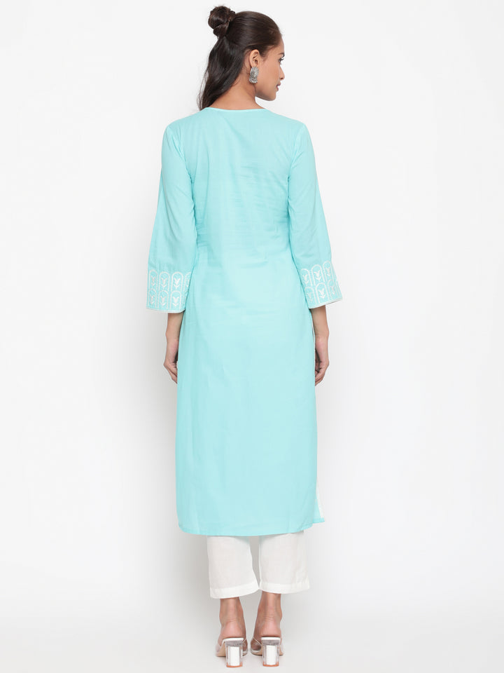 Woman posing in Embroidered Sky Blue Cotton Straight Fit Kurta by Savi