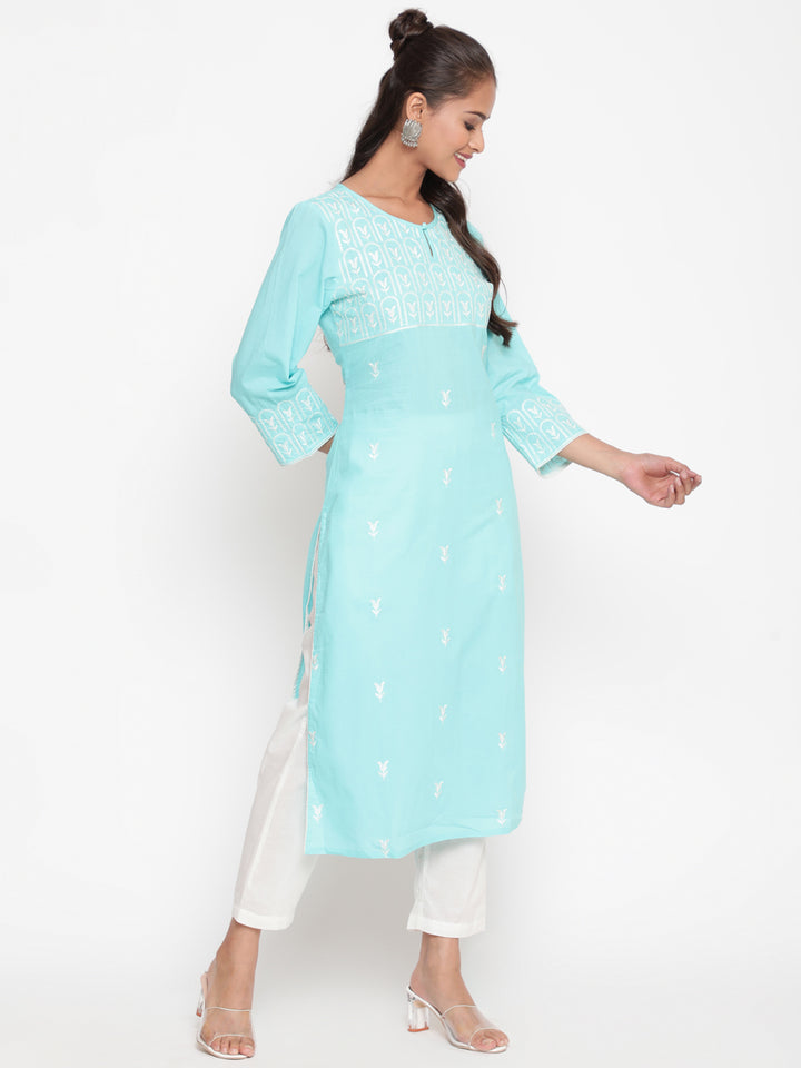 Woman posing in Embroidered Sky Blue Cotton Straight Fit Kurta by Savi