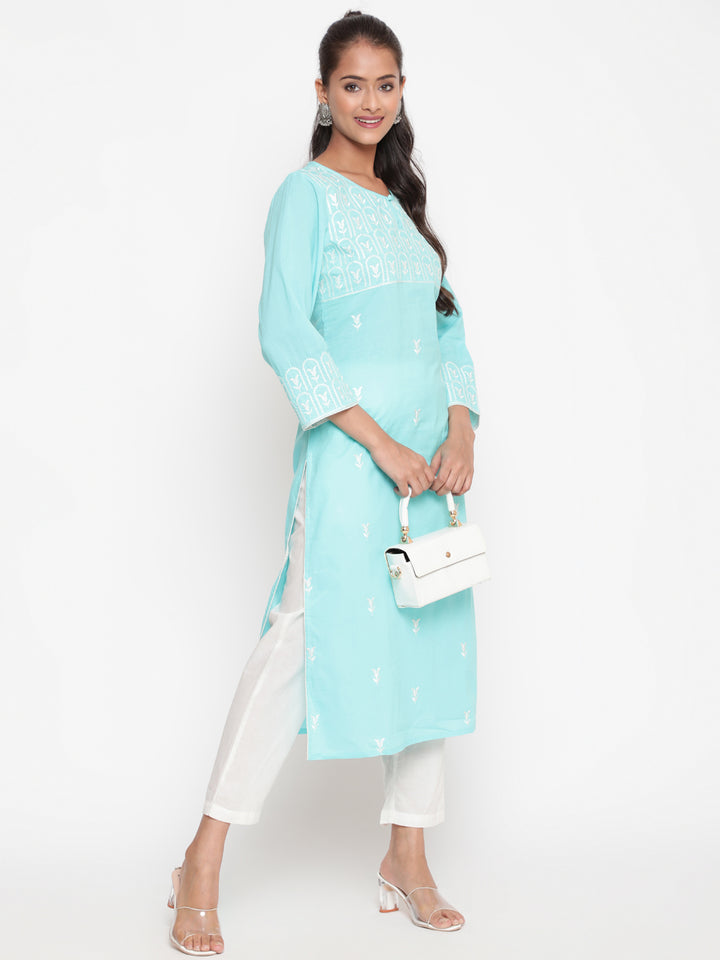 Woman posing in Embroidered Sky Blue Cotton Straight Fit Kurta by Savi