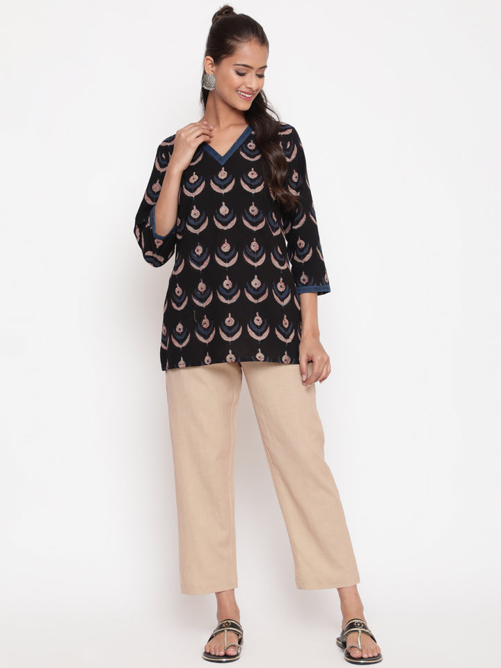 Woman posing in Savi's Bagru Printed Cotton Black Casual Tunic
