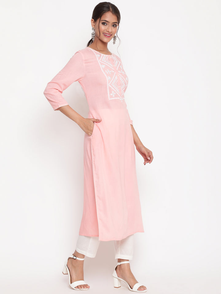 Woman posing in Pink Embroidered Casual A Line Kurta