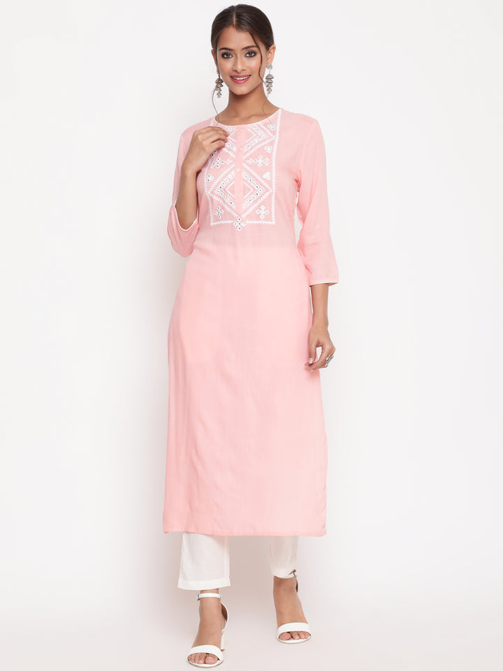 Woman posing in Pink Embroidered Casual A Line Kurta