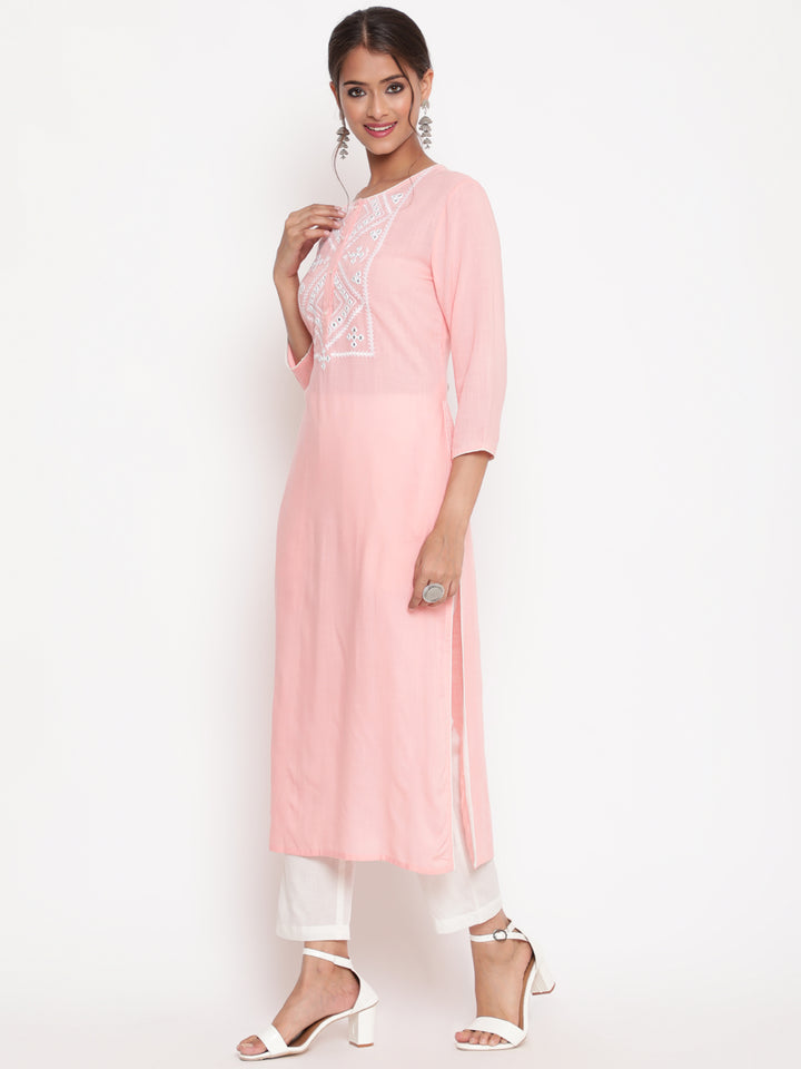 Woman posing in Pink Embroidered Casual A Line Kurta