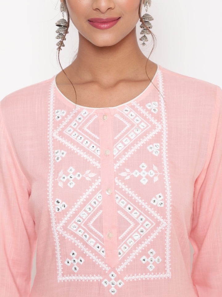 Woman posing in Pink Embroidered Casual A Line Kurta