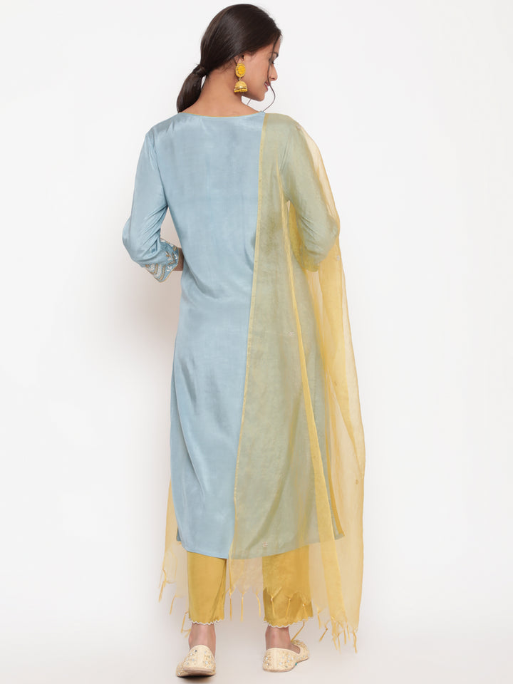 Woman posing in Powder Blue Embroidered Kurta Pant set With Organza Dupatta