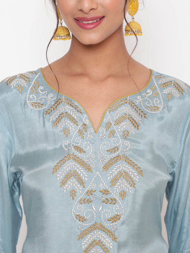 Woman posing in Powder Blue Embroidered Kurta Pant set With Organza Dupatta
