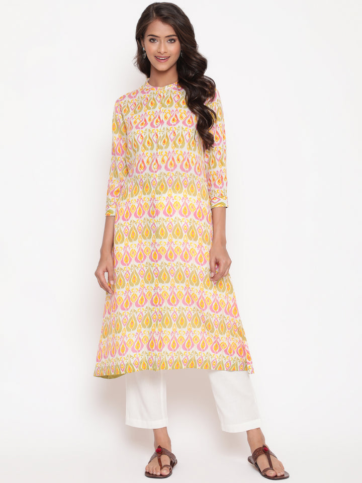 Woman posing in Peach Pink Rayon Ikat Printed Mandarin Collar Kurta