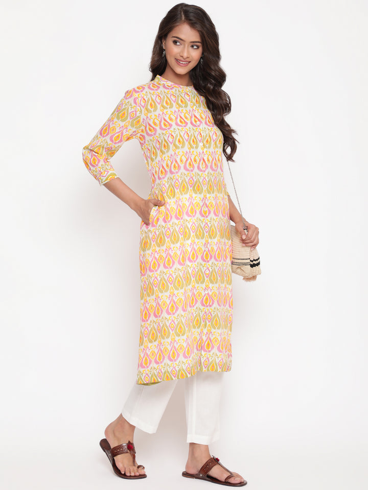 Woman posing in Peach Pink Rayon Ikat Printed Mandarin Collar Kurta