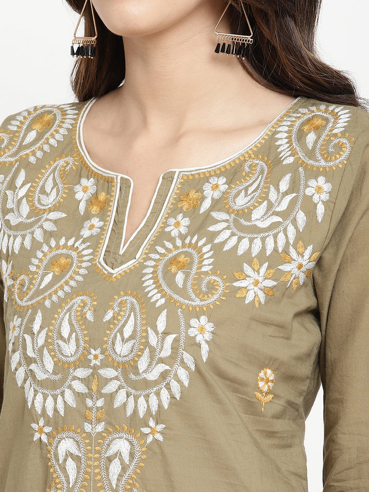 Olive Green Cotton Embroidered Straight Kurta Pant Set showcased by Savi model.
