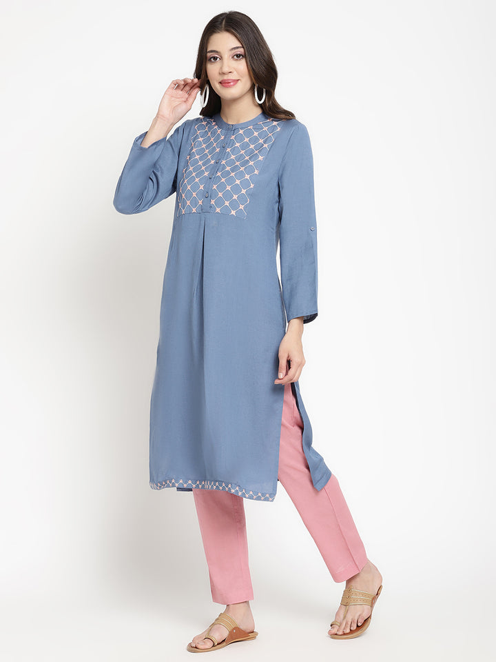 Woman wearing rayon blue Kurta by Savi.