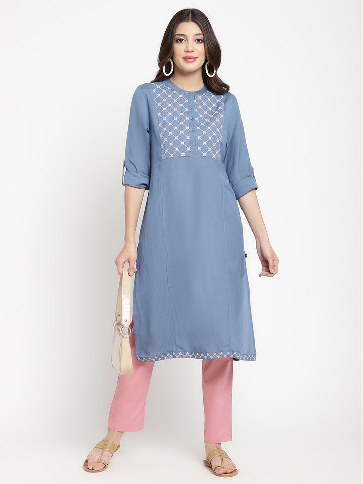 Woman wearing rayon blue Kurta by Savi.