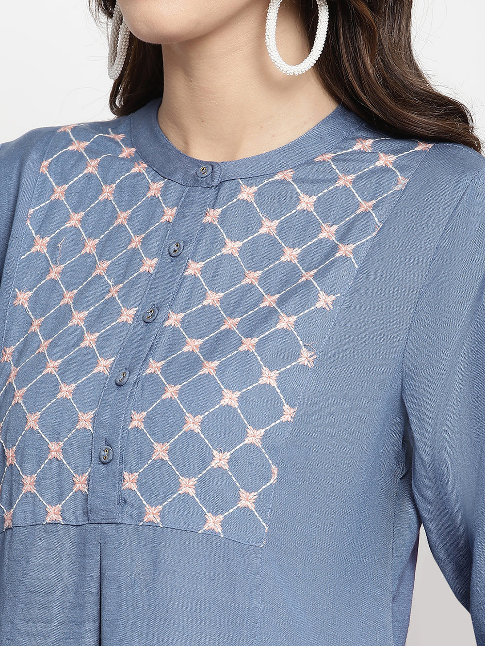 Woman wearing rayon blue Kurta by Savi.