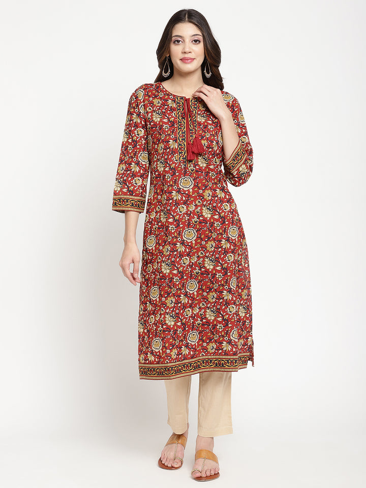 Model standing and wearing a rust Kurta with a straight-fit.