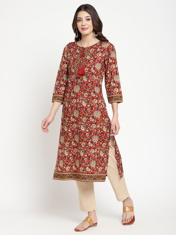 Model standing and wearing a rust Kurta with a straight-fit.