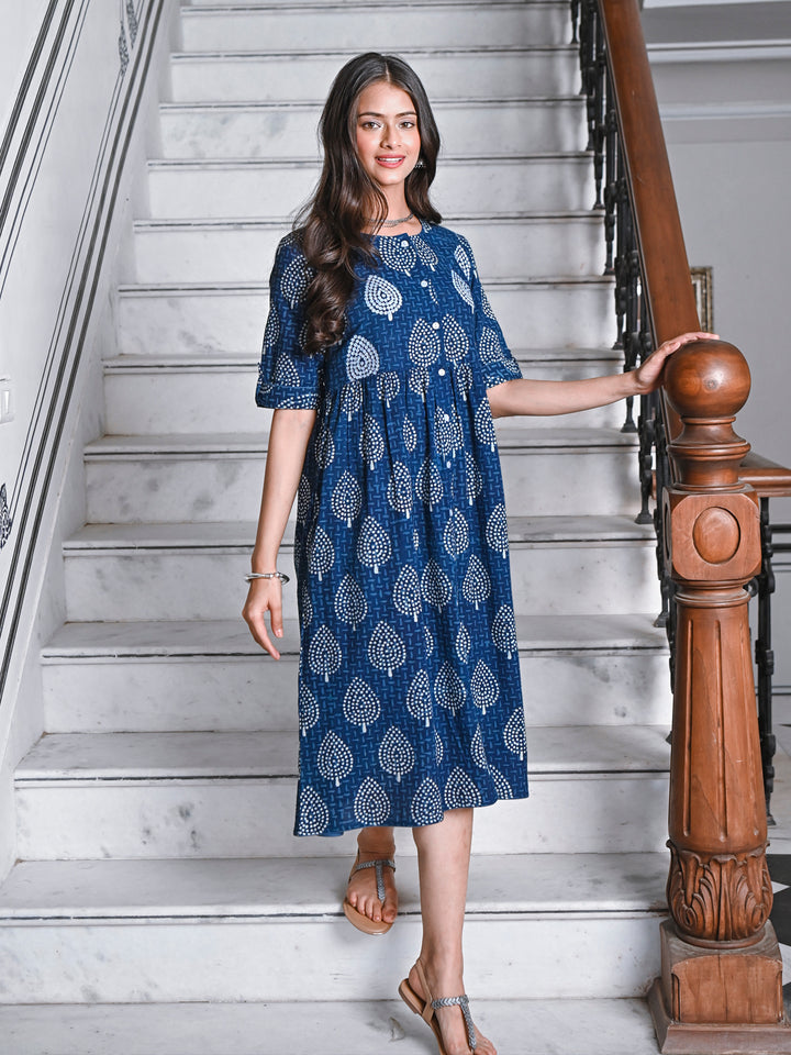 Woman posing in Savi's Cotton Indigo Ethnic Motif printed Button Closure Dress