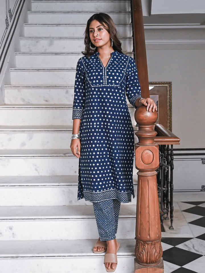 Woman posing in Savi's Cotton Indigo Printed casual Kurta Pant Set