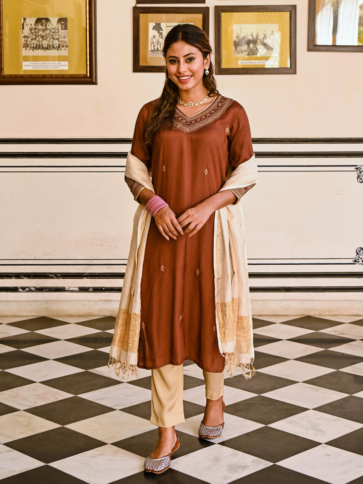 Woman posing in Brown Embroidered Straight Kurta Pant Set