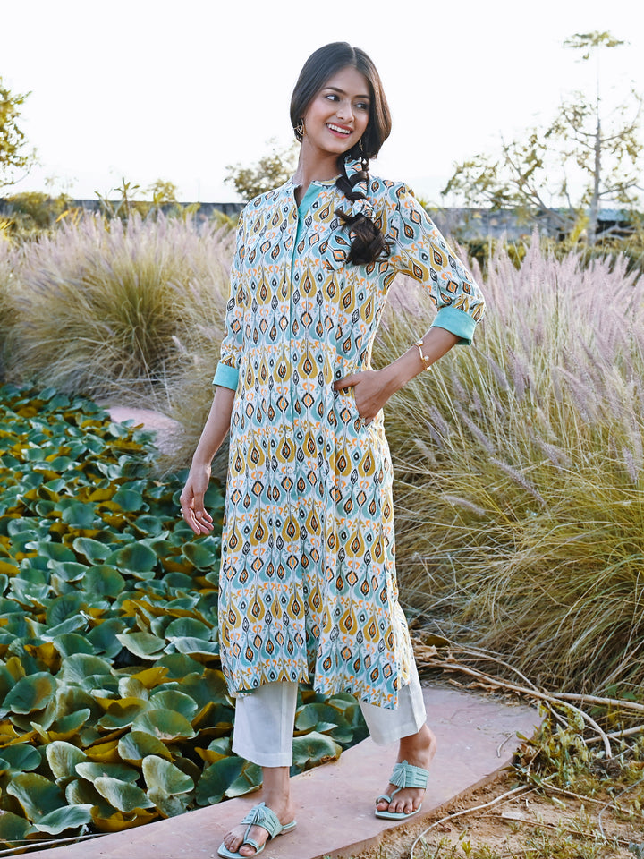 Woman posing in Blue Rayon Ikat Printed Mandarin Collar Kurta