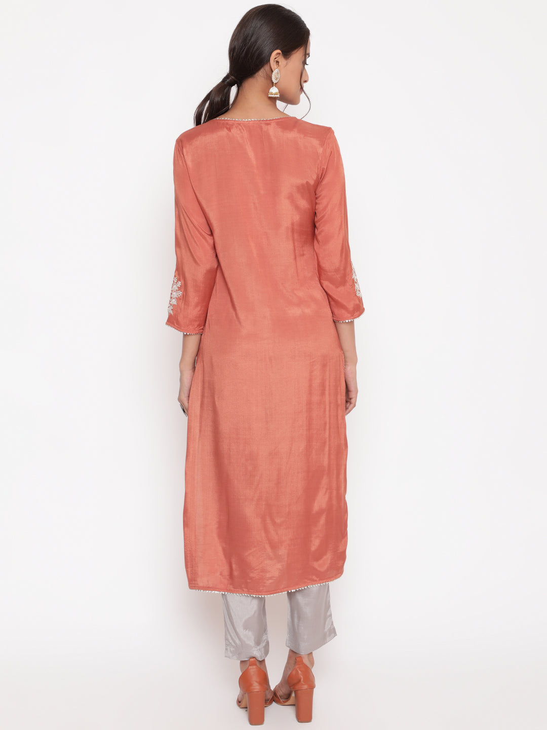 Woman posing in Rust Embroidered Straight Kurta Pant Set