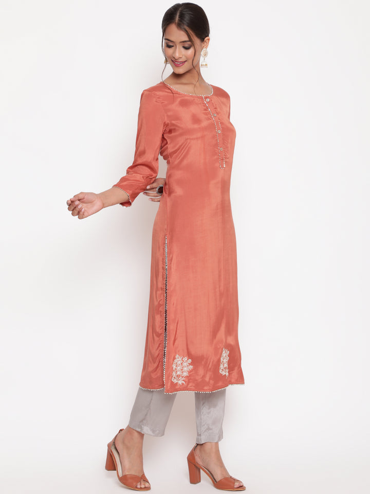 Woman posing in Rust Embroidered Straight Kurta Pant Set