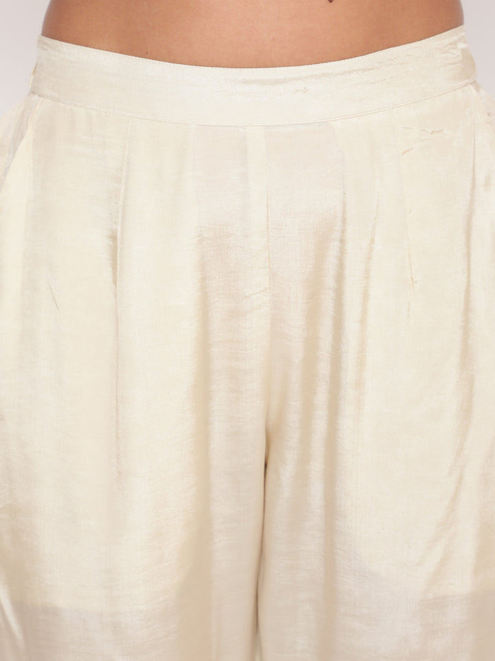 Woman posing in Savi’s Shantoon Embroidered Mustard Straight Kurta With Solid Pant