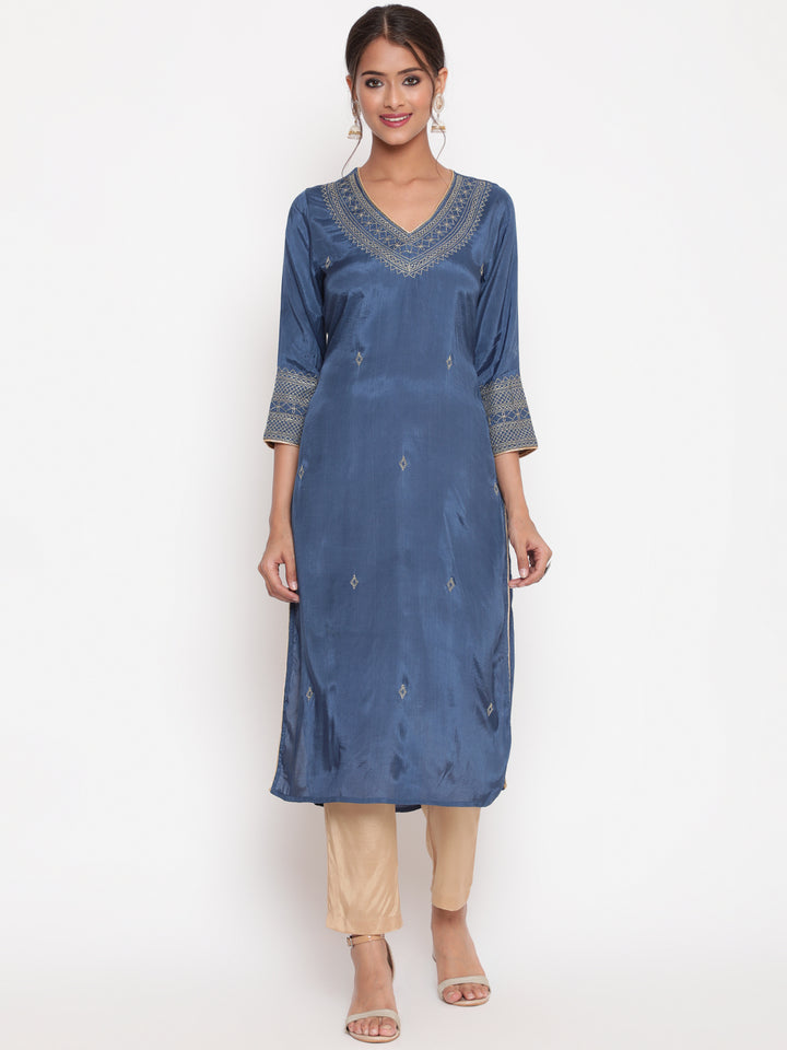 Woman posing in Blue Zari Embroidered Straight Kurta Pant Set