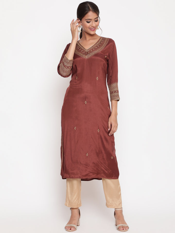 Woman posing in Brown Embroidered Straight Kurta Pant Set