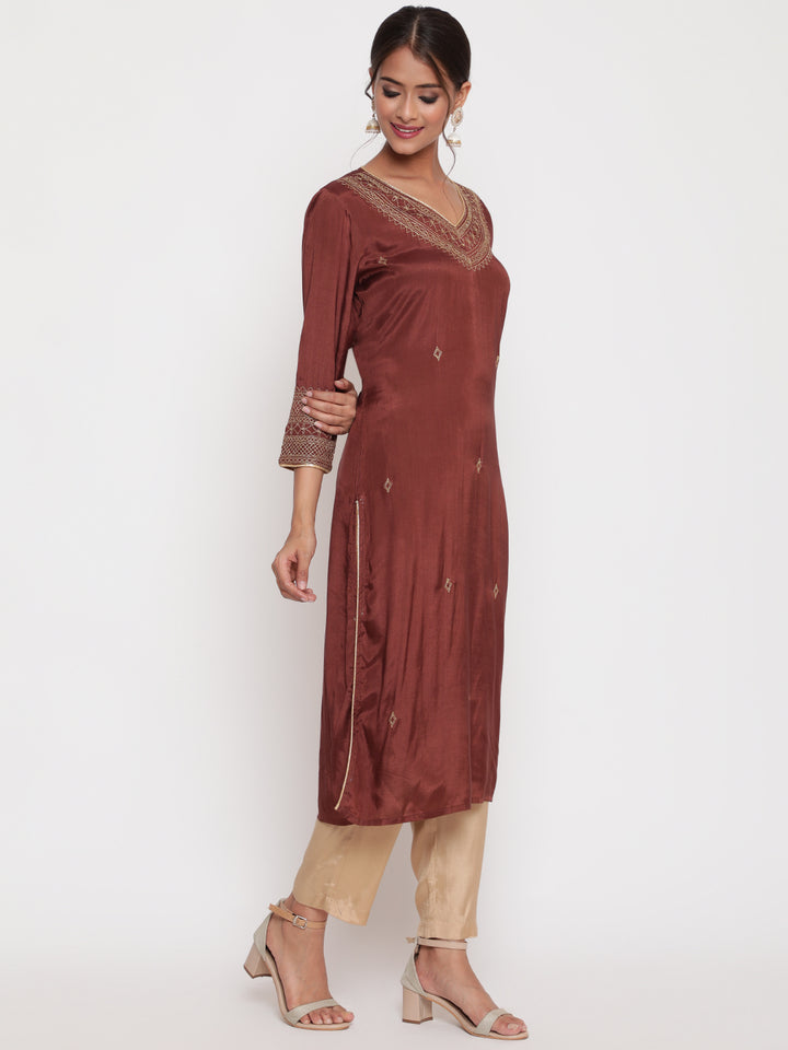 Woman posing in Brown Embroidered Straight Kurta Pant Set