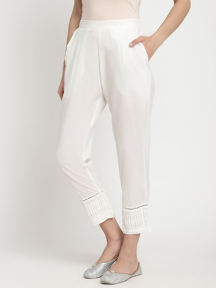 Wide shot of Savi’s White Cotton Pintuck Straight Pant.