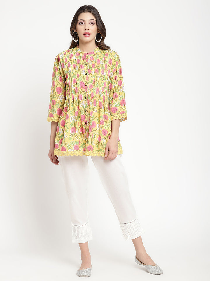 Wide shot of Savi’s White Cotton Pintuck Straight Pant.