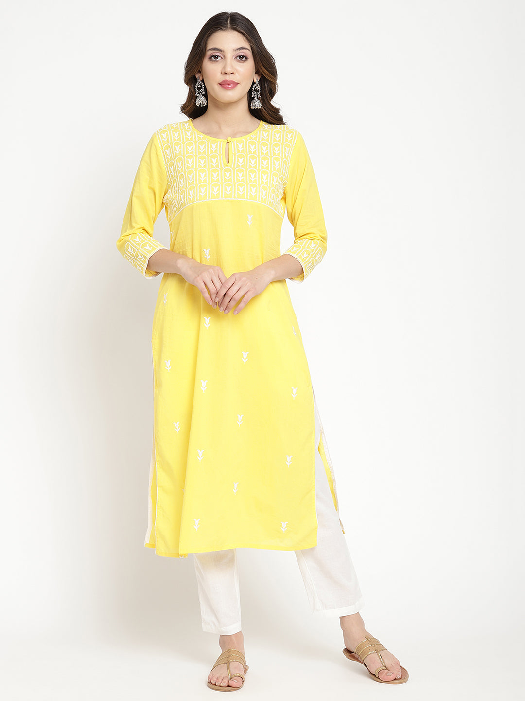 Woman wearing Savi's yellow cotton Kurta.