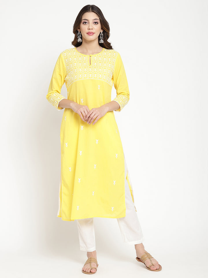 Woman wearing Savi's yellow cotton Kurta.