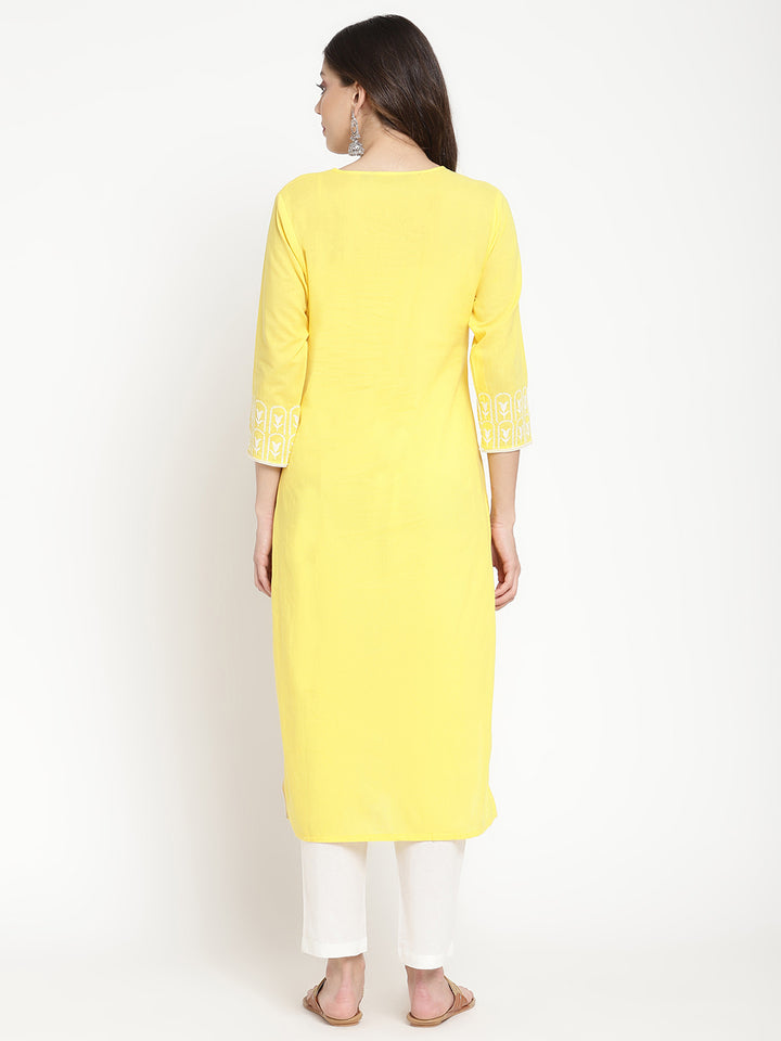 Woman wearing Savi's yellow cotton Kurta.